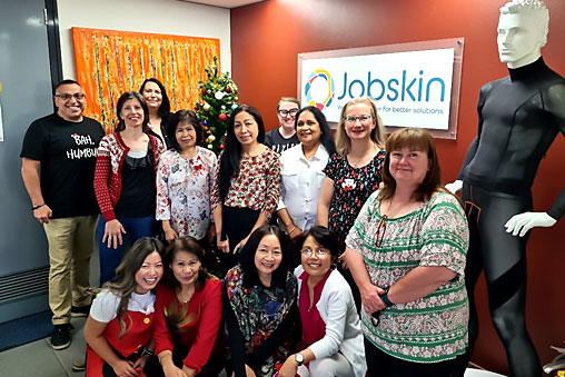 customer service team at Jobskin looking festive